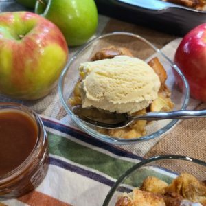 Caramel apple bread pudding with ice cream scoop