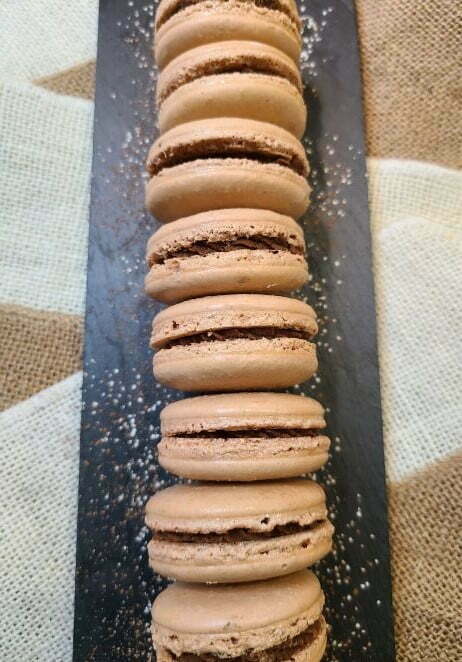 A row for chocolate and peanut butter macarons