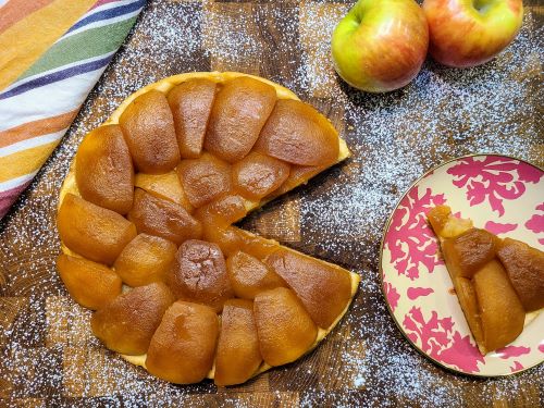 Apple tarte Tatin with a slice removed