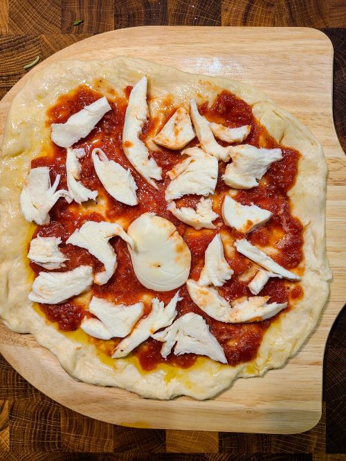 Pizza Margherita ready to go into the oven
