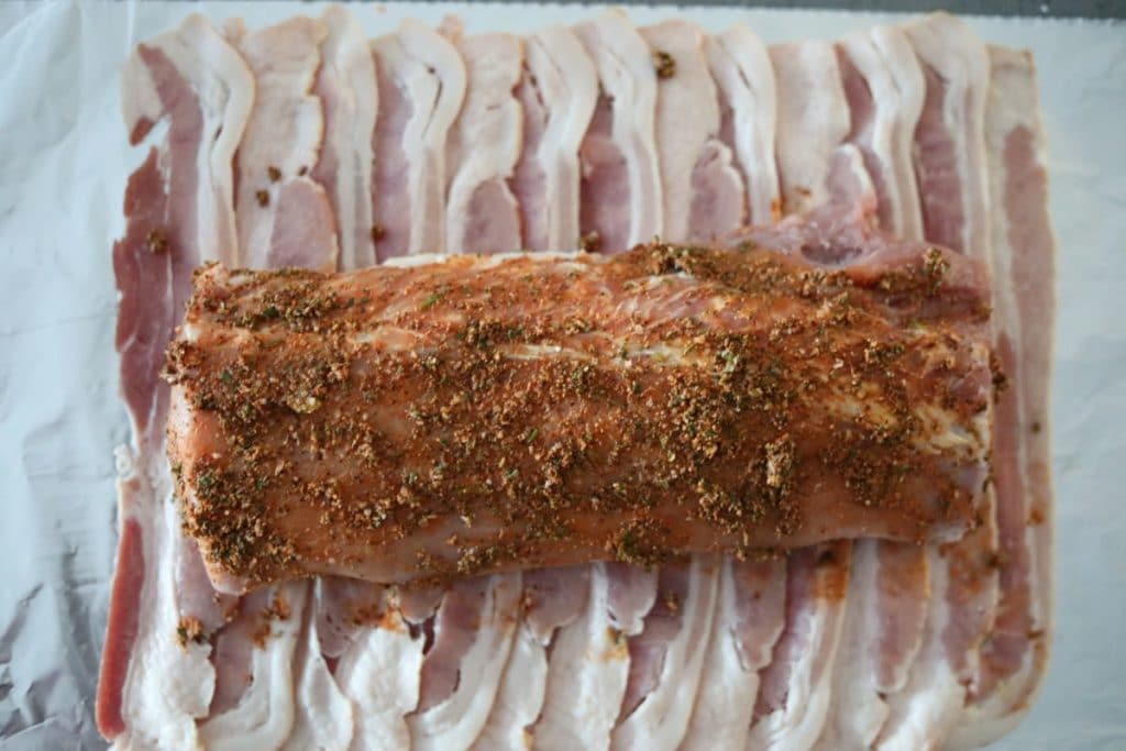Centering pork loin on bacon