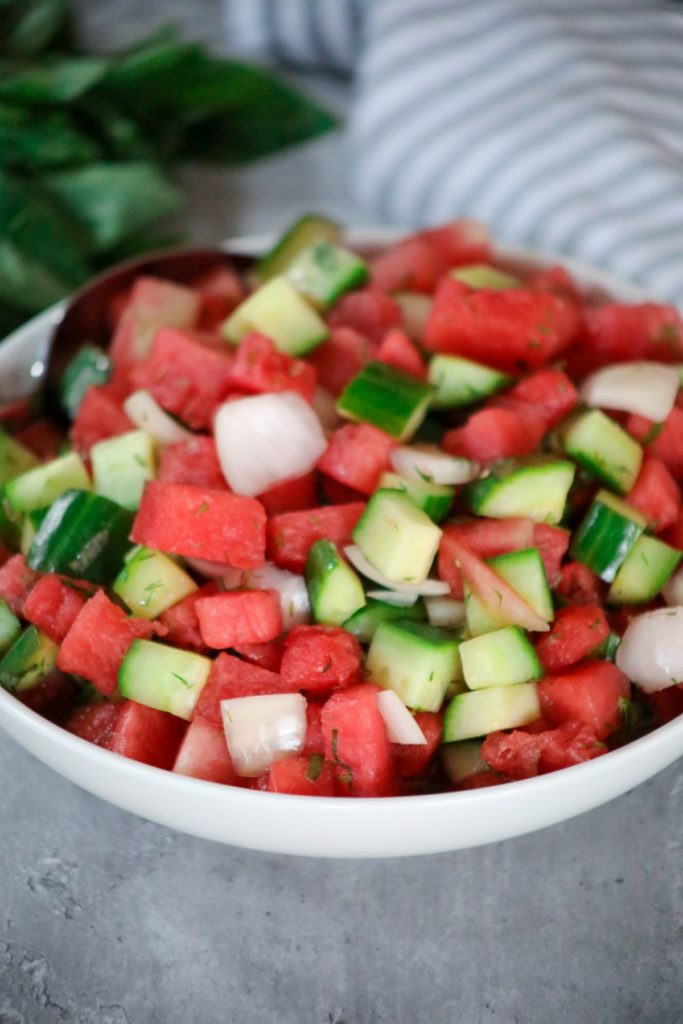 Watermelon salad in a white bowl