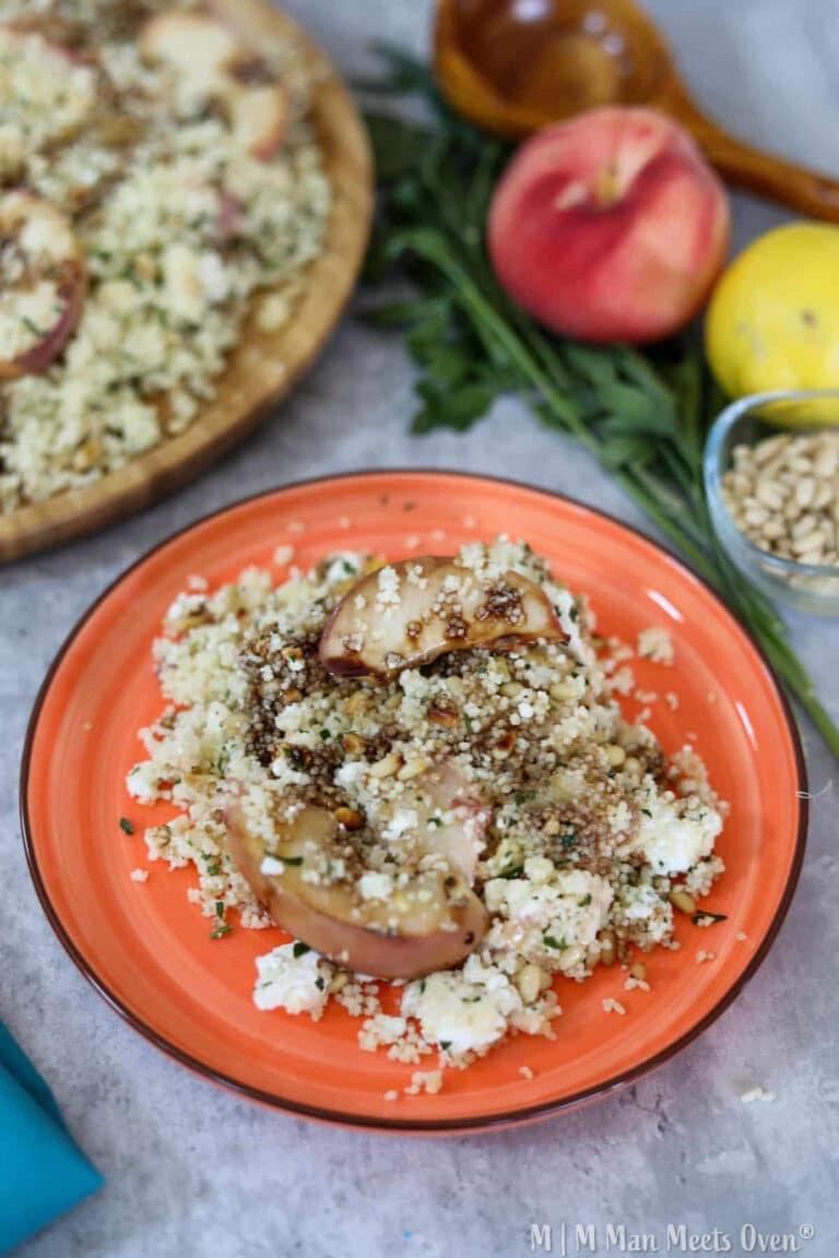 Peach couscous on an orange plate