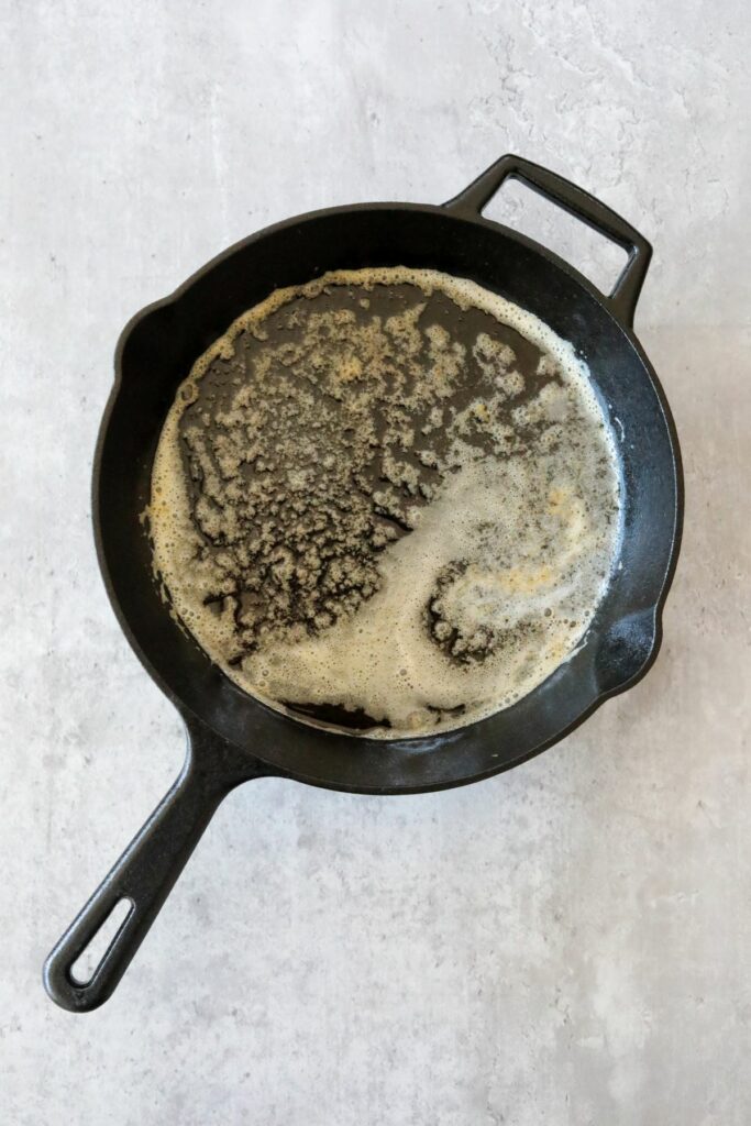 Melted butter in a cast iron skillet