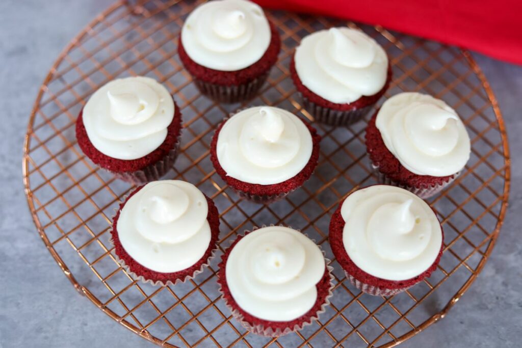 red velvet cupcakes on a cooling rack