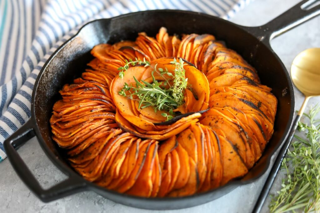 Cast iron skillet with spicy roasted sweet potatoes