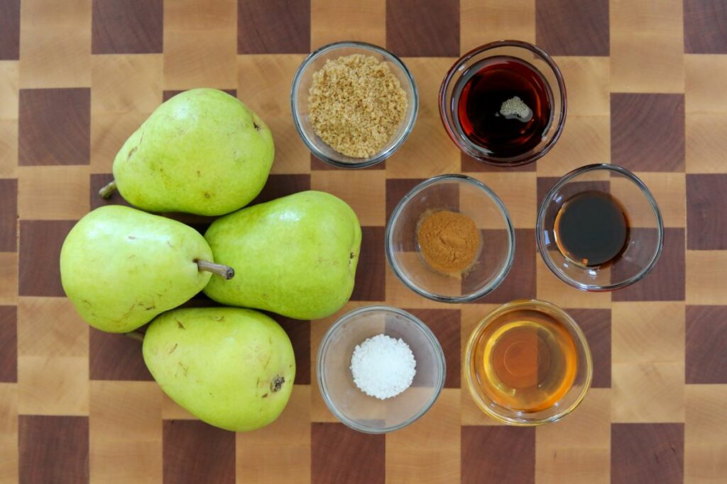 Ingredients for baked pears on a cutting board