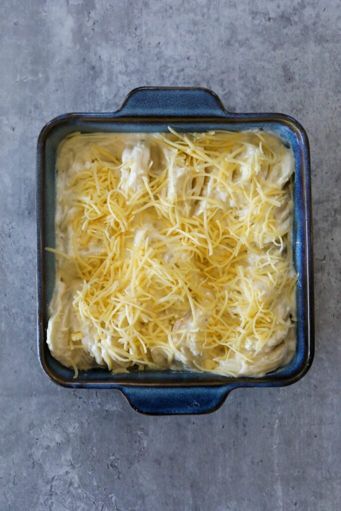 potatoes covered in shredded cheese