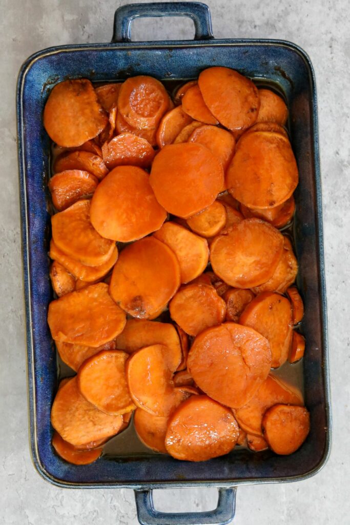 cooked sweet potatoes in a baking dish
