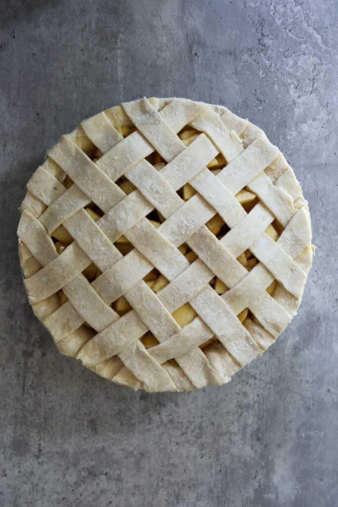 Uncooked apple pie with lattice crust