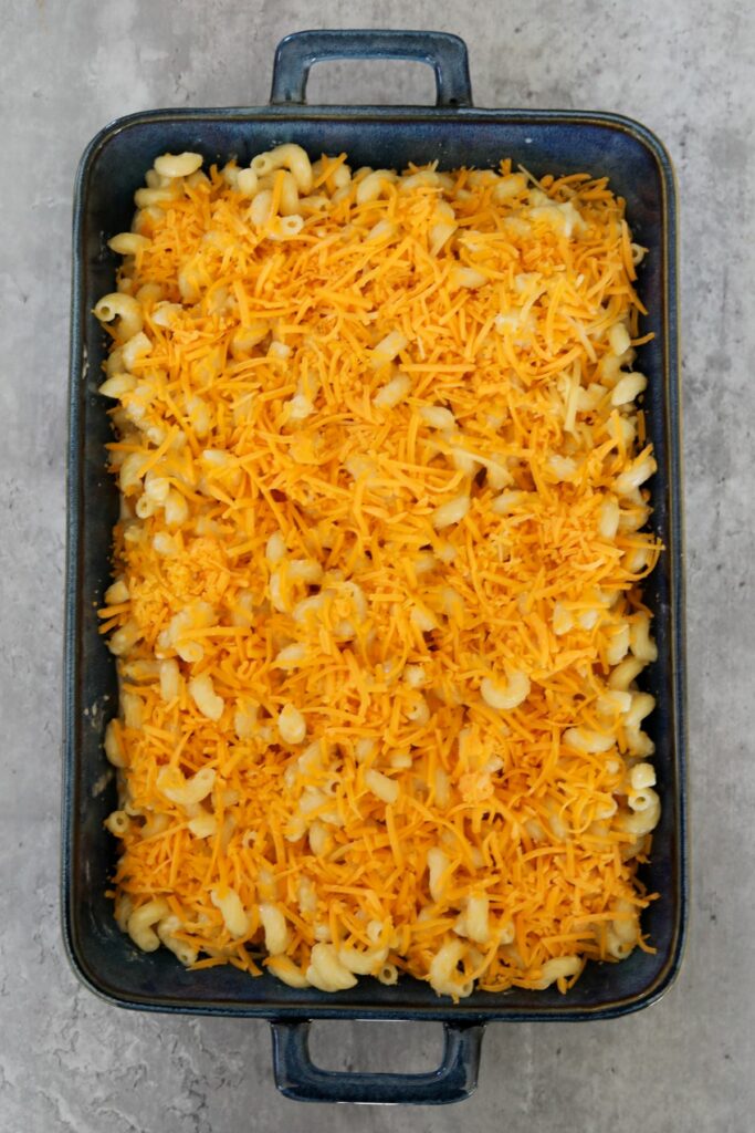 Unbaked macaroni and cheese in a baking dish