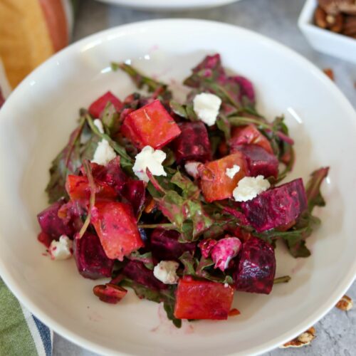 roasted beet salad in a white bowl