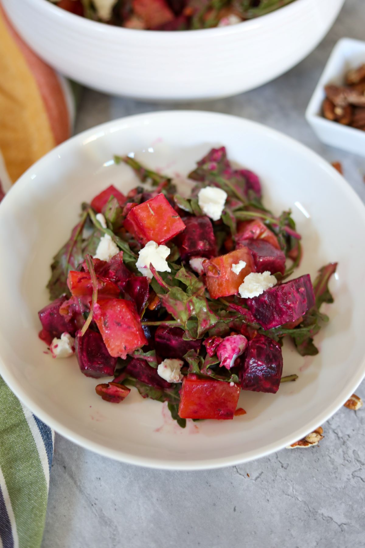 roasted beet salad in a white bowl