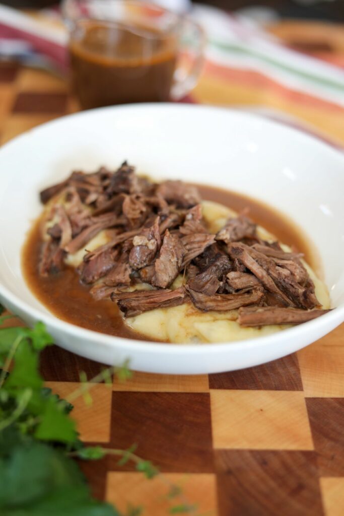 braised short ribs in a white bowl