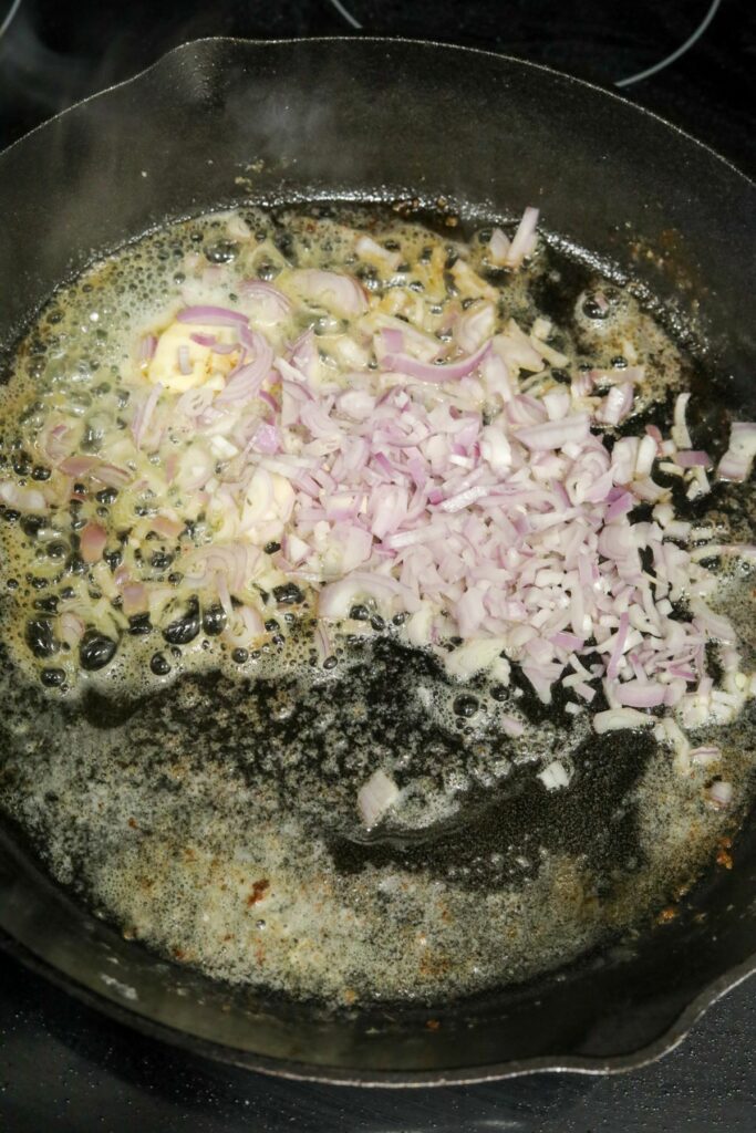 Shallots and butter in a skillet