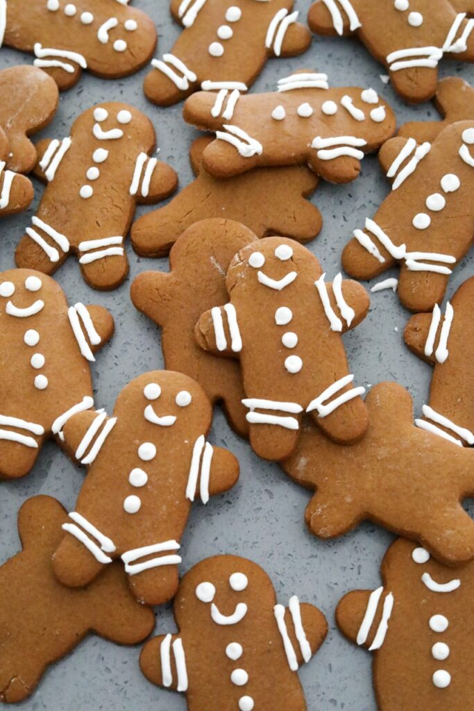 Iced gingerbread cookies in a pile