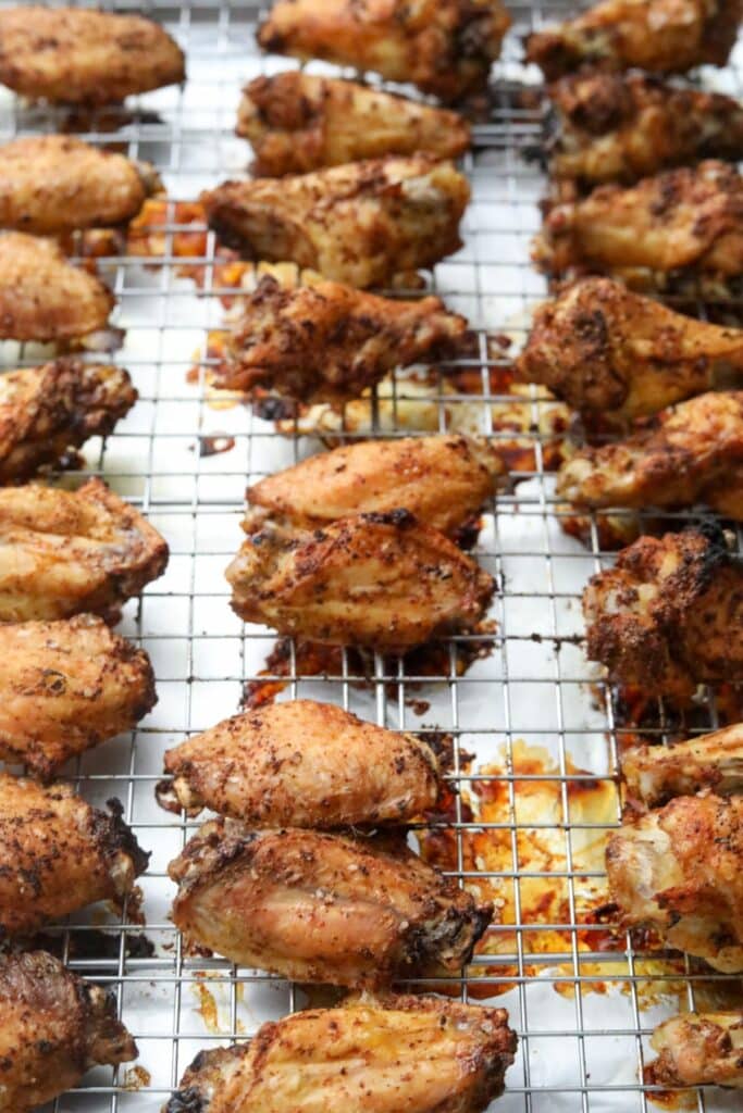 Cooked wings on a baking rack