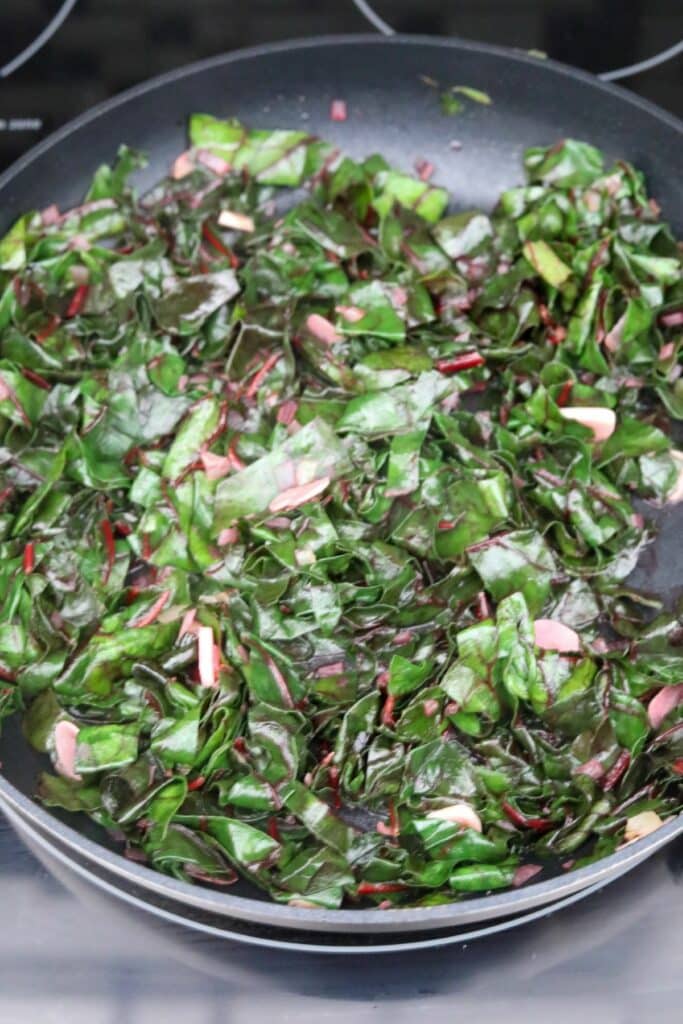 A pan of wilted Swiss chard