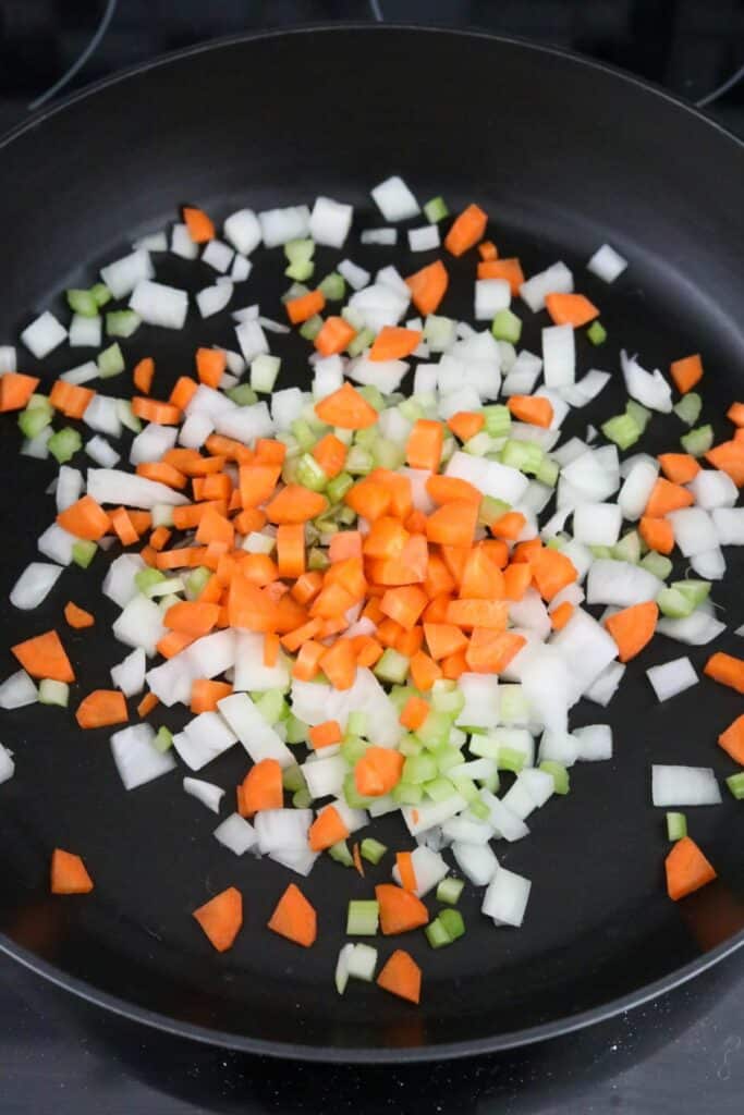 Diced mirepoix in skillet