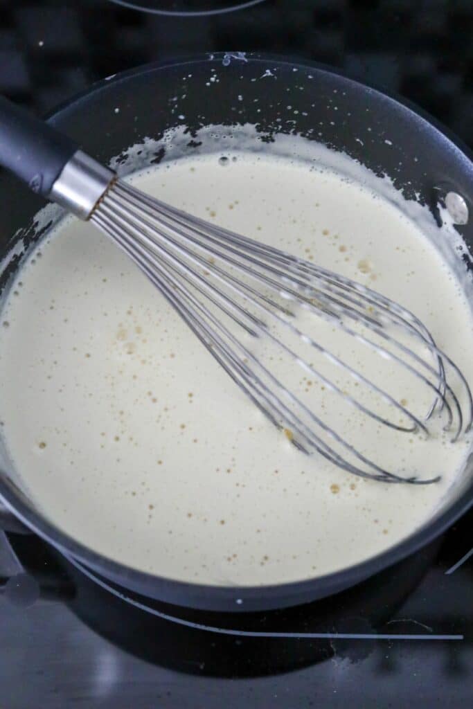 Cooking the crème patisserie in a saucepan