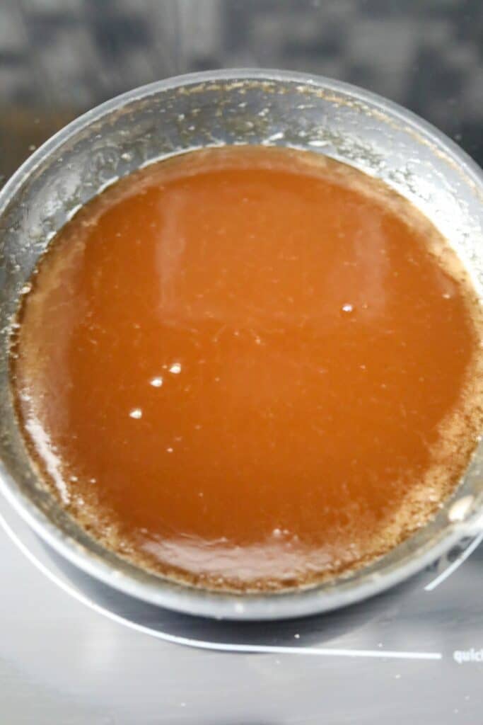 A pan of bourbon sauce