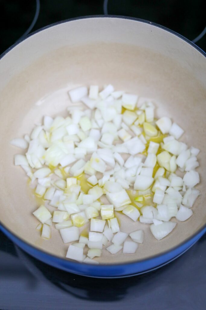 Onions and olive oil in a Dutch oven