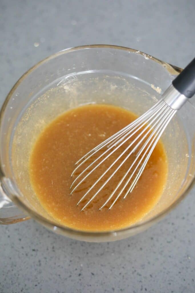 Mixing bowl with melted butter and sugar
