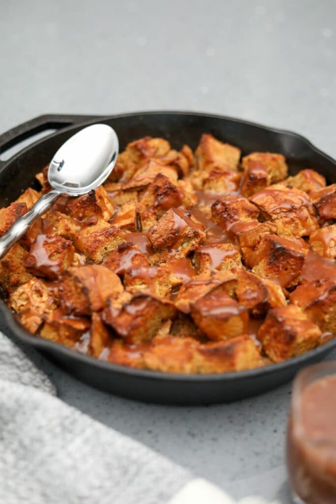 Cooked soda bread pudding in a cast iron skillet