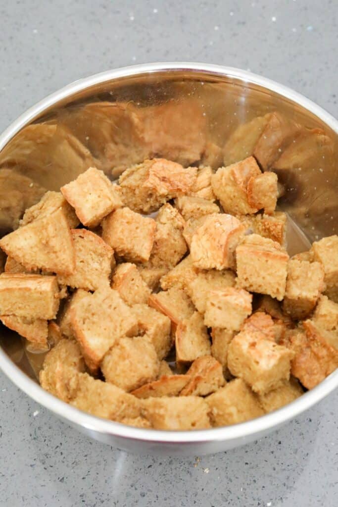 Bread pudding mixture in a bowl