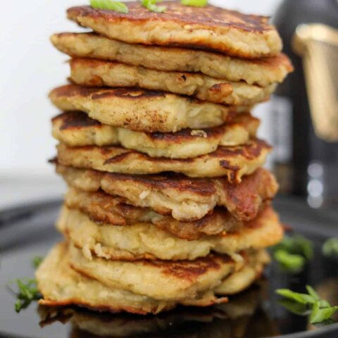 A tall stack of boxty on a plate
