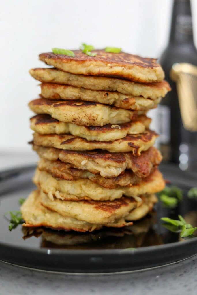 A tall stack of boxty on a plate