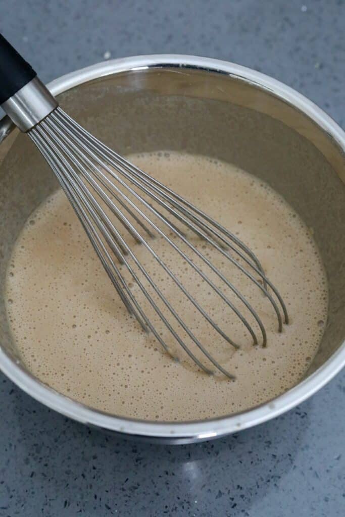 Beer batter in a mixing bowl
