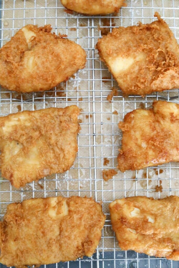 Fried fish on a cooling rack