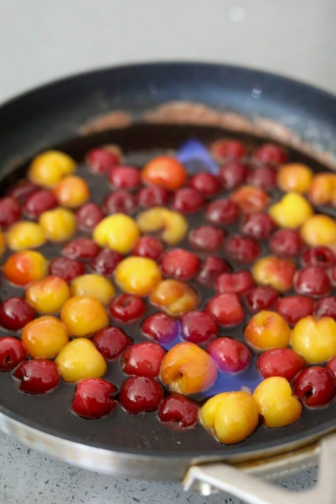 Flambéed cherries in a pan