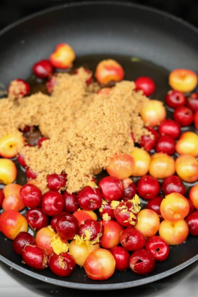 cherries jubilee ingredients in a sauté pan
