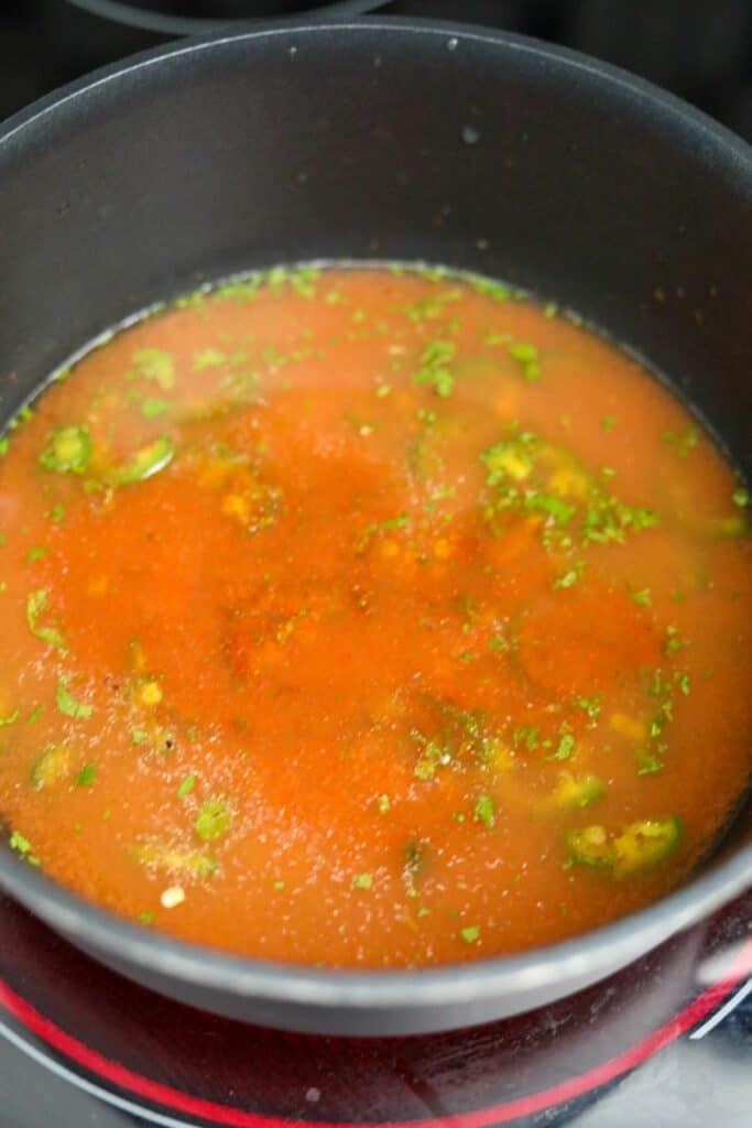 A saucepan of the marinade before reducing