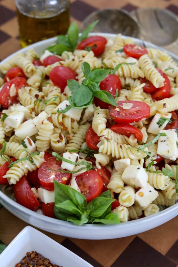 A bowl of Caprese pasta salad