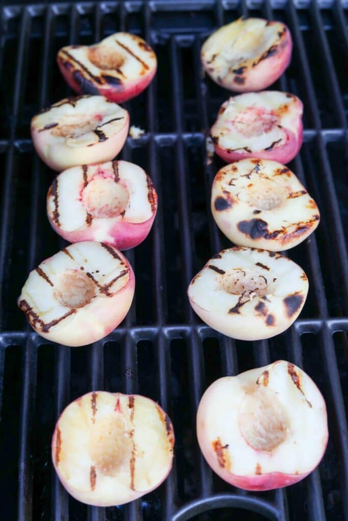 Grilled peaches on a grill