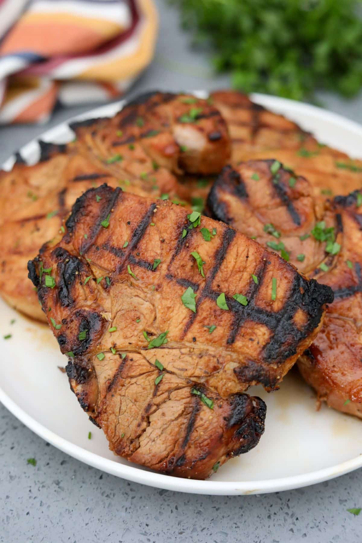 A plate of grilled pork chops