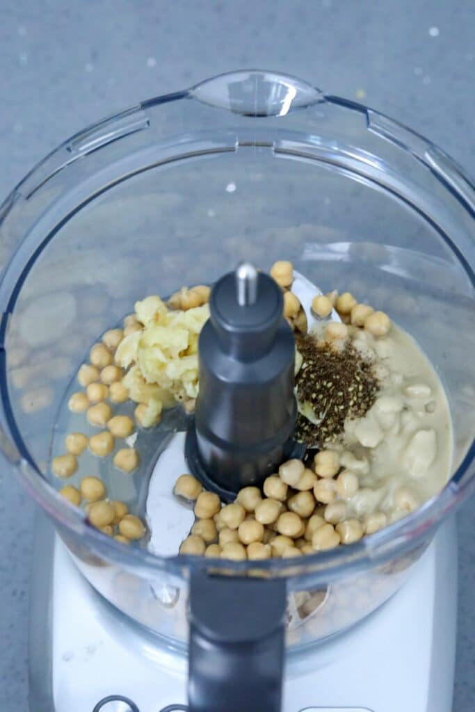 Hummus ingredients in a food processor