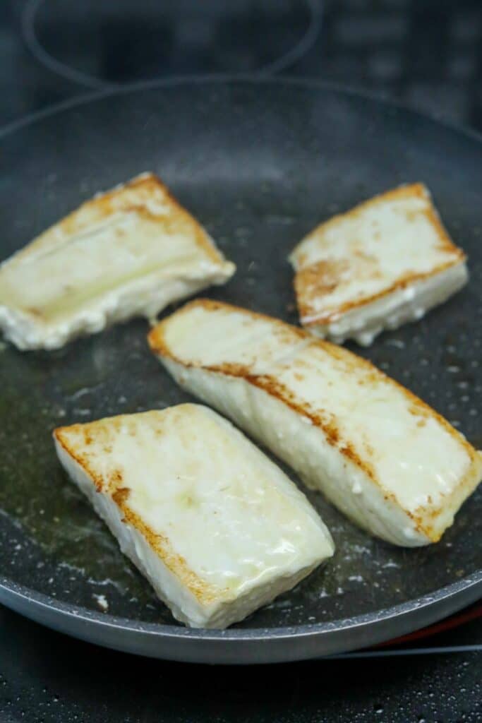 Seared halibut in a pan