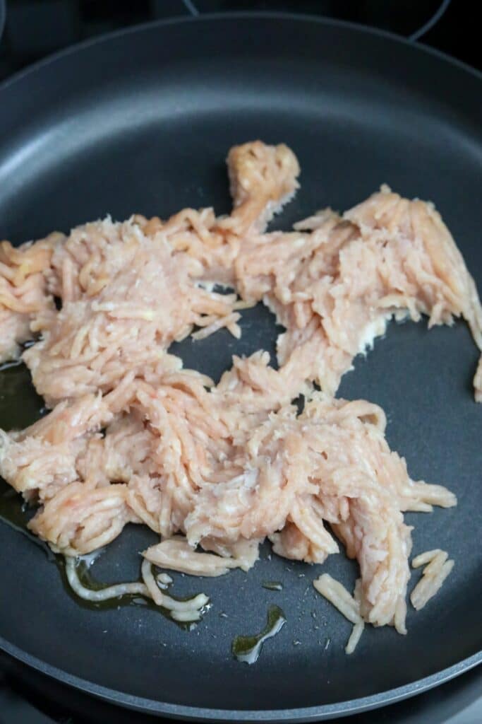 Cooking ground chicken in a pan