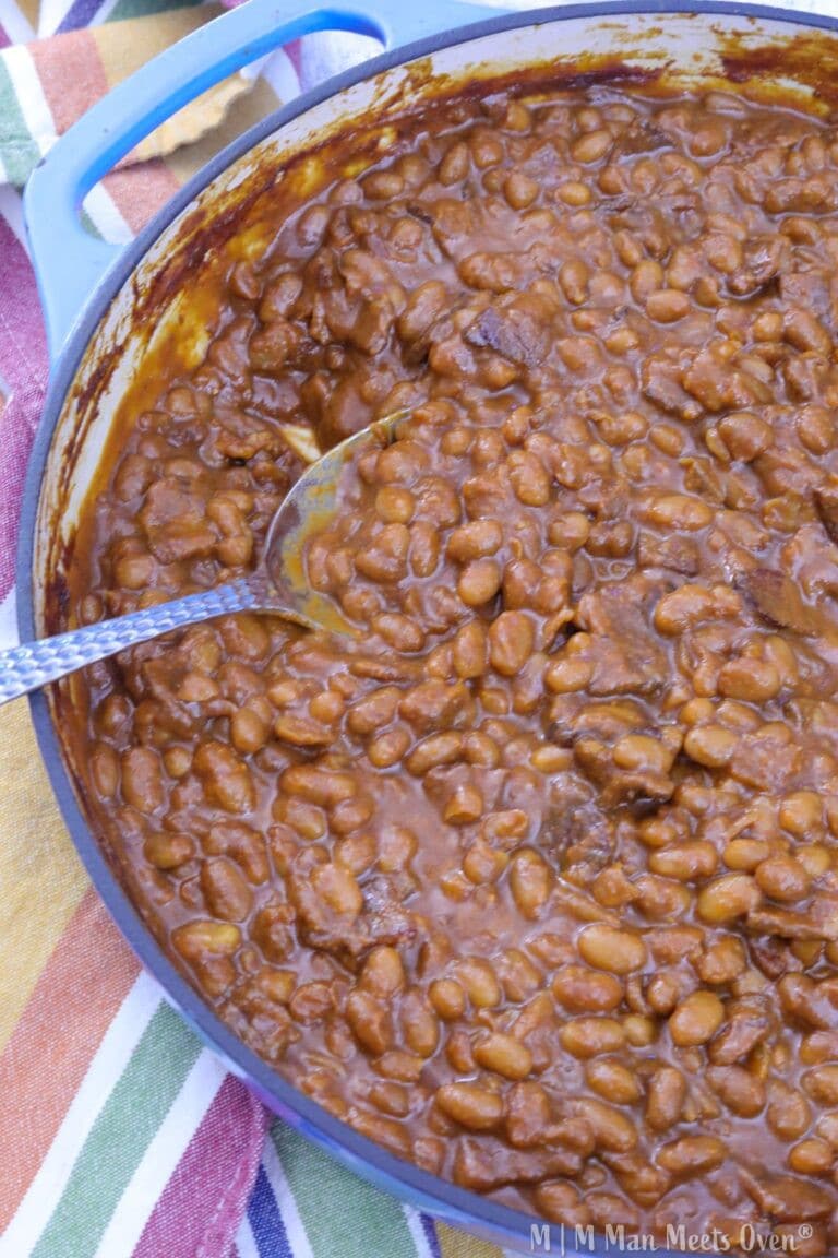 Cooked baked beans in a casserole dish