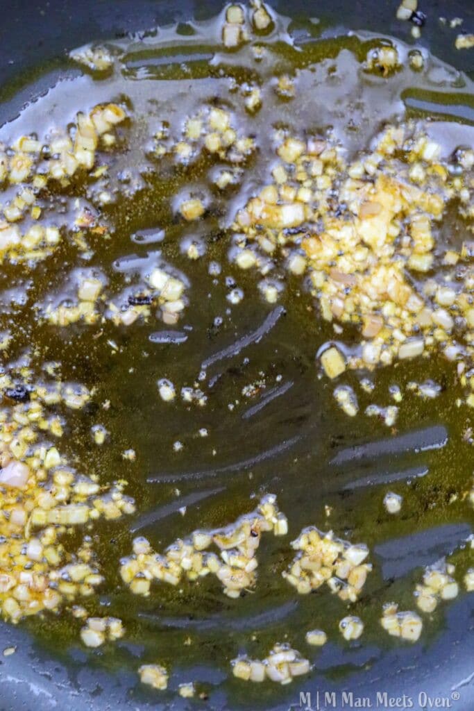 Sauteed shallots and garlic in a pan