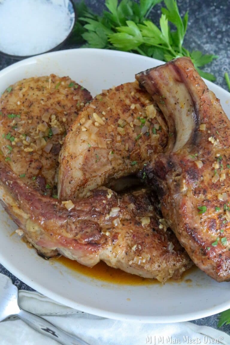 A white bowl with brown sugar pork chops