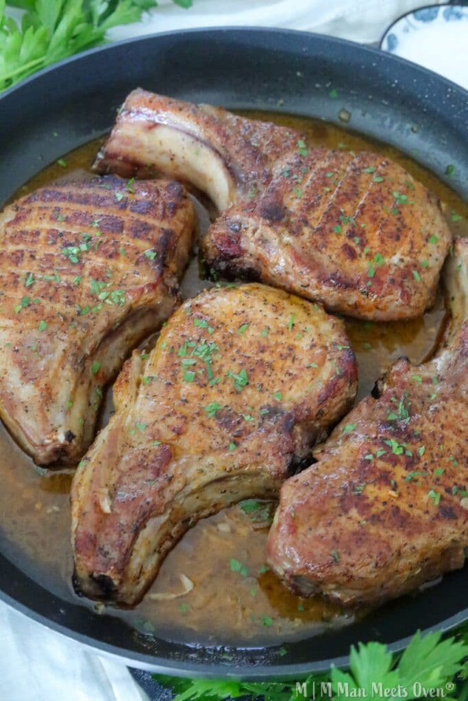 Brown sugar pork chops in a pan