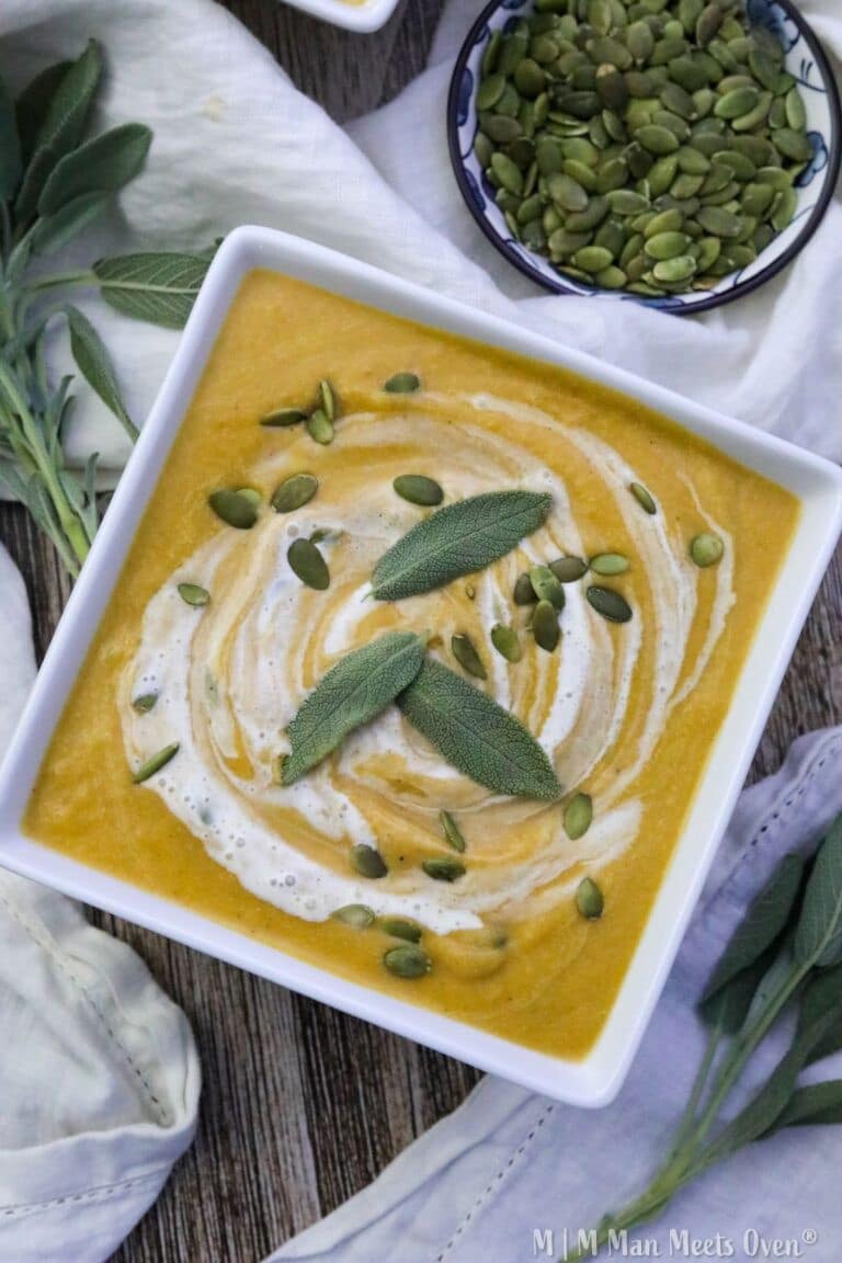 Maple and sage butternut squash soup in a white bowl