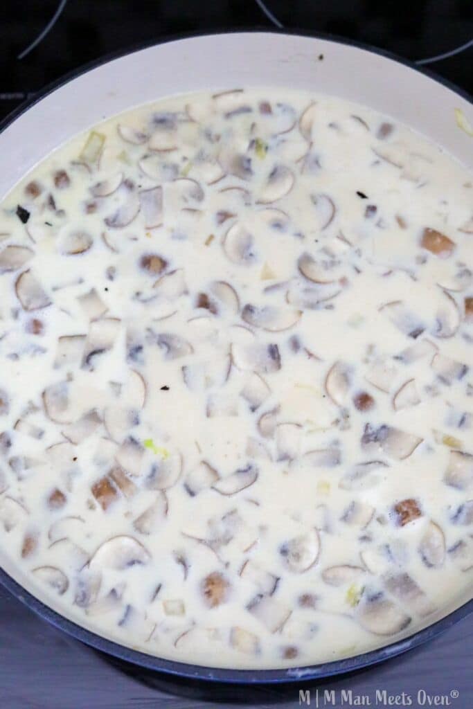 Creamy mushroom mixture in a pan