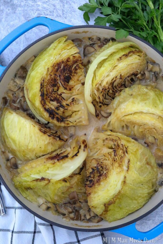 Cooked cabbage with mushrooms in dish