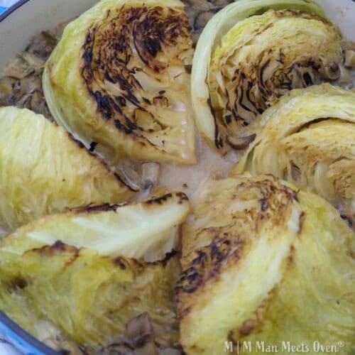 Cooked melting cabbage in a blue pot